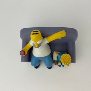 Statuetta I Simpson Homer e Bart sul divano di Demons et Merveilles, Francia 1998